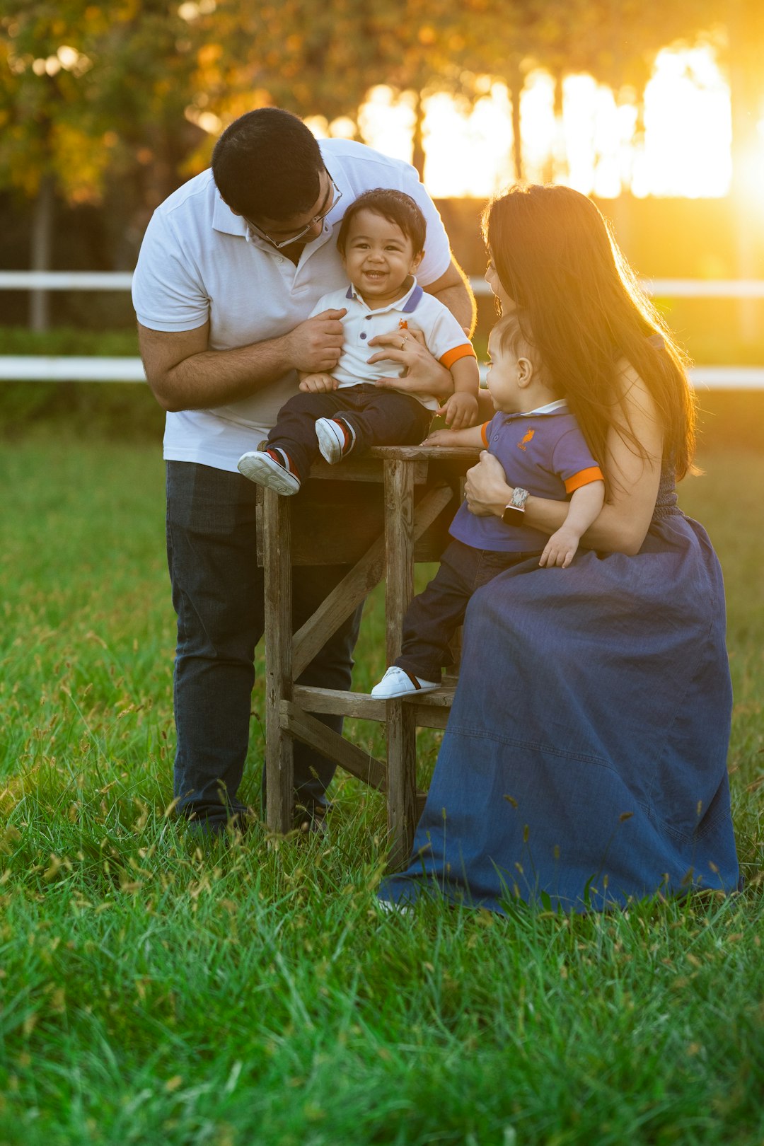 Parents and young children enjoying an evening outdoors